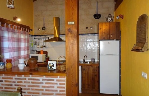 Torreiglesias Cottage | Balcony of Nut I: private garden of 500 m2, wifi, barbecue, fireplace, pets.