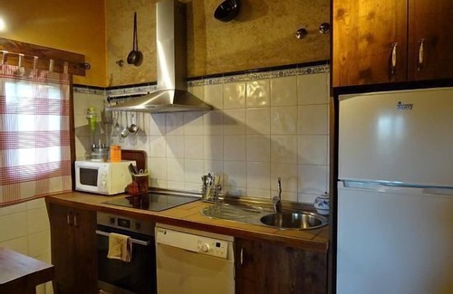 Torreiglesias Cottage | Balcony of Nut I: private garden of 500 m2, wifi, barbecue, fireplace, pets.