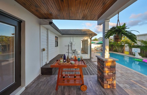North Hyde Park House | Bali Resort Home with pool, putting green, golf simulator, game room