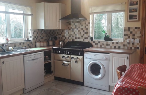 County Cork House | Ballygown Cottage with views across open countryside out to the mountains