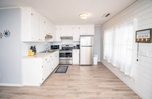 Morehead City House | Barefoot Beach South: Fantastic location, steps from sand with views of the bay!