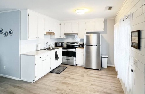 Morehead City House | Barefoot Beach South: Fantastic location, steps from sand with views of the bay!