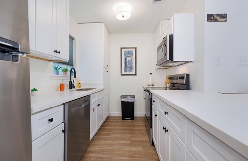 Biloxi Condo | Barefoot & Breezy- Downtown 2-bedroom condo with optional golf cart rental