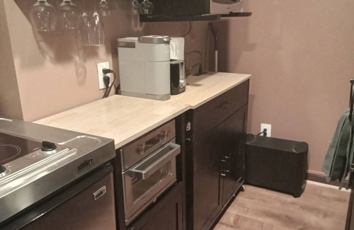 Lansing Apartment | Basement Apartment, Outdoor Hot Tub add on, infrared Sauna, Pool Table and more