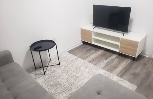 Darby House | Basement Retreat by the Airport