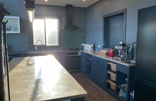 Methven House | Bathed in sunshine with stunning mountain views, relax in luxury after a ski.