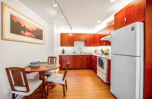 Adelma Beach House | Bayfront apartment with private patio, beach access, water views, AC & W/D