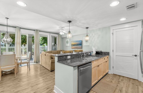 Baytowne Wharf Condo | Baytowne Wharf Condo with Walk Out Patio & Tram Service