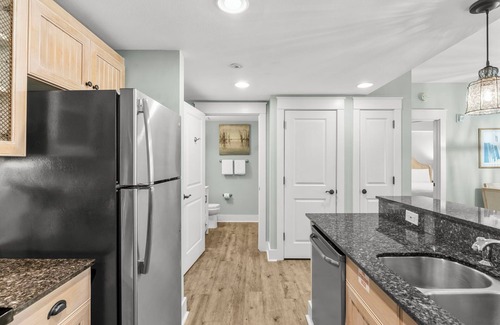 Baytowne Wharf Condo | Baytowne Wharf Condo with Walk Out Patio & Tram Service