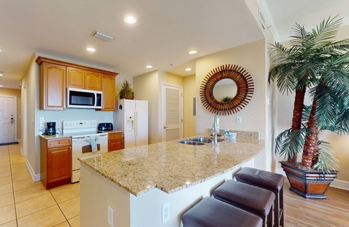 Upper Grand Lagoon Condo | Bayview condo with pool, hot tub, and private balcony