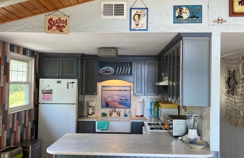 East Falmouth House | Beach front, fenced yard, dogs welcome, central air, fire pit, 3 kayaks, hot tub