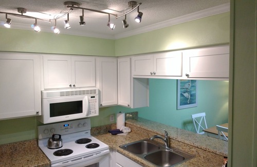 Morehead City Condo | Beach Front Resort w/150' Water slide, Free Mini Golf, Indoor Pool, Tennis,more