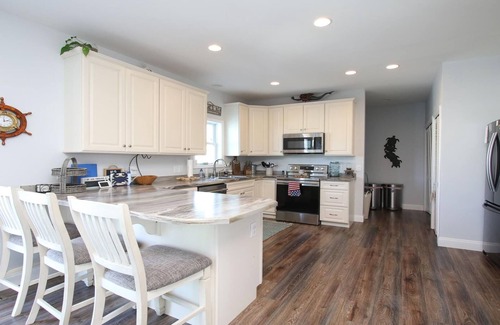 Beach Haven West House | Beach Haven West. Pet Friendly. Waterfront. Lagoon front. Beach Badges. WIFI.