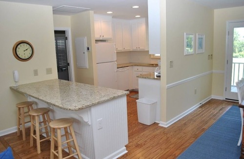 North Litchfield Beach House | Beach house featuring screen porch with rockers & swing located at North Litchfield Beach.