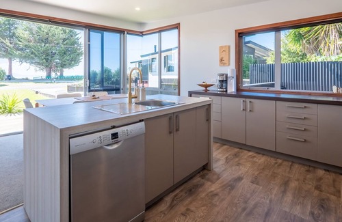 Pohara House | Beach Stay is a modern and comfortable beach bach close to the beach
