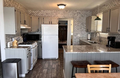 Petoskey Cottage | Beach Themed Cottage on Crooked Lake - Sleeps 6