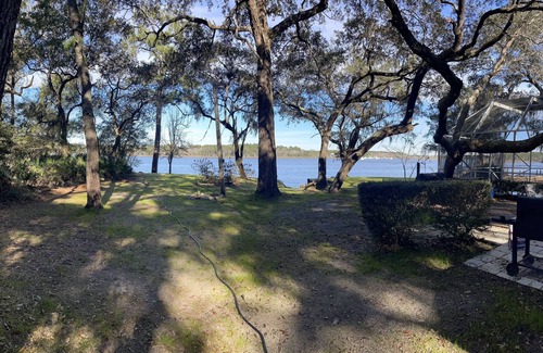 Freeport House | Beach to Bayou Waterfront property with Heated Pool available, Spa, Game Room.