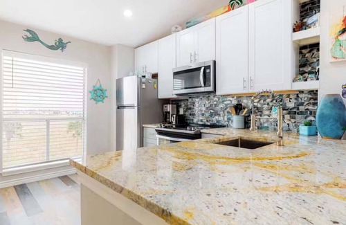 Corpus Christi Condo | Beachclub Summary: Go