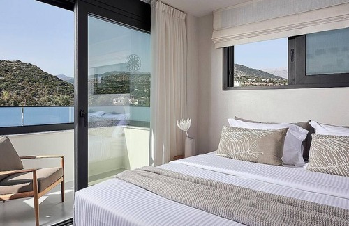 Almyros Villa | Beachfront 3 bedroom villa with a heated pool