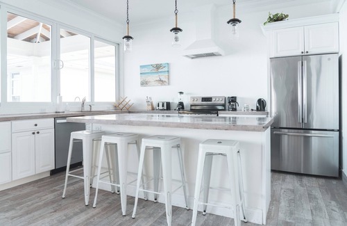 William's Town House | BEACHFRONT! Best Location on Private Lazy River Sand Bar. Always Calm Water!