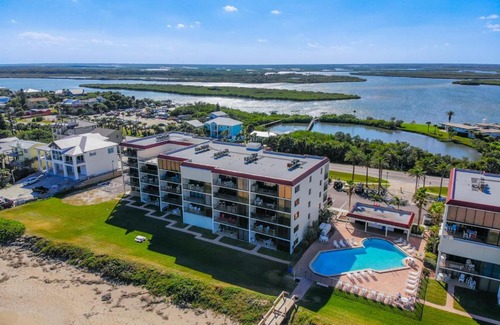Bethune Beach Apartment | Beachfront Chadham-by-the-Sea 318 Pool Car Free Beach