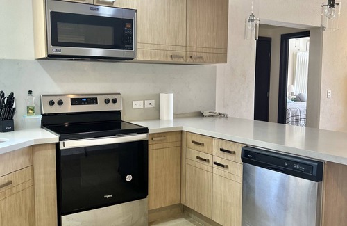 Flamingos Condo | Beachfront Condo at Krystal Grand Resort