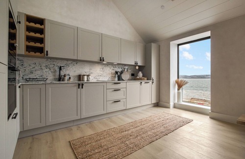 Baglan Apartment | Beachfront eco-friendly penthouse with ocean view and modern interior sleeping up to 5