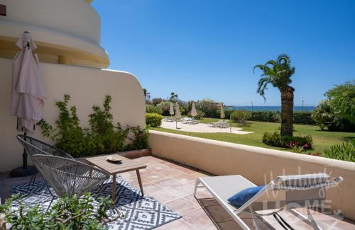 Nikki Beach Apartment | Beachfront Elviria II,Sea views, lovely terrace and pool
