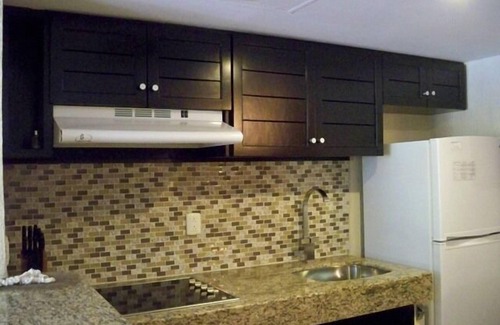 Puerto Aventuras Condo | Beachfront Location with 2 Pools; Private Terrace