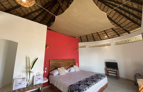 Santa Maria Tonameca Hotel | Beachfront villa is settled in Playa Agua Blanca 25 min from Puerto Escondido.