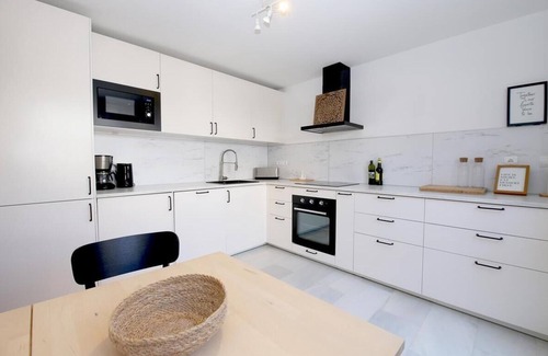 Estepona House | Beachside family townhouse with air con and Wifi, Next to the beach and close to Estepona Port