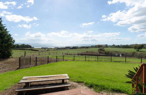 Clarks Beach House | Beachview Bliss - Clarks Beach Holiday Home