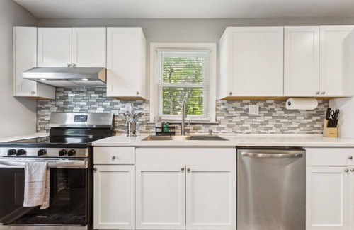 Kansas City House | Beachy Haven Duplex - 3BR/2BA, Pet-Friendly with Firepit