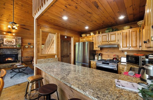 Walnut Mountain Cabin | Bear Point, pet friendly and set against a backdrop of breathtaking mountain views! Relax in the hot tub, play pool and enjoy the gas fire-table. WiFi