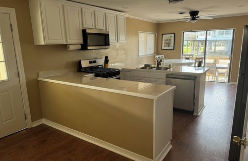Slidell House | Beautiful 3-bedroom Home on the Water in serene Slidell with WiFi, AC, Huge Deck
