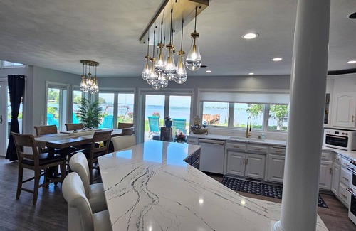 Oshkosh House | Beautiful 5 bedroom 3.5 bath EAA lakehouse.n with the most beautiful sunsets.