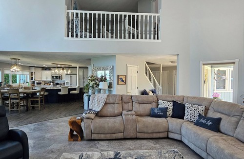 Oshkosh House | Beautiful 5 bedroom 3.5 bath EAA lakehouse.n with the most beautiful sunsets.