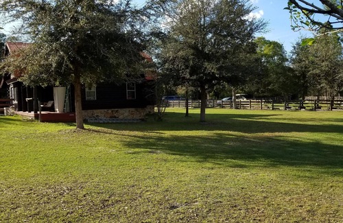 St. Cloud Cabin | Beautiful 5 Bedroom Log Cabin on 100 Acres with Pool, close to orlando
