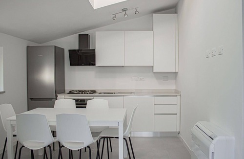 Sistiana House | Beautiful apartment in villa for 6 guests with A/C, WIFI, pool, TV, terrace and parking