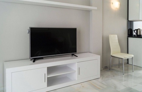 Urbanizacion Hacienda las Chapas Apartment | Beautiful apartment for 5 people with A/C, WIFI, pool, TV, terrace, pets allowed and panoramic v.