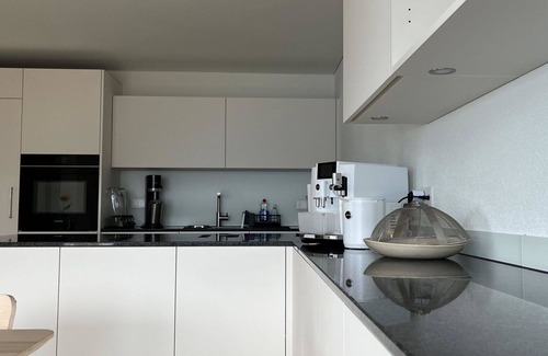 Spiez Apartment | Beautiful apartment for 12 people with WIFI, TV, balcony and pets allowed