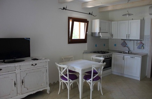 Cala Liberotto Apartment | Beautiful apartment in a villa on the sea and direct access to the beach