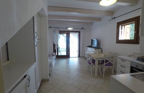 Cala Liberotto Apartment | Beautiful apartment in a villa on the sea and direct access to the beach
