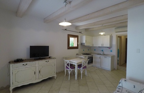Cala Liberotto Apartment | Beautiful apartment in a villa on the sea and direct access to the beach