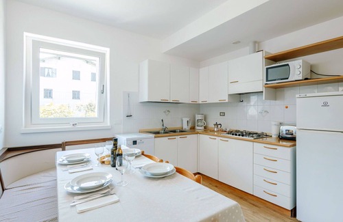 Caldonazzo Apartment | Beautiful apartment for 4 people with WIFI, TV, patio, pets allowed and parking
