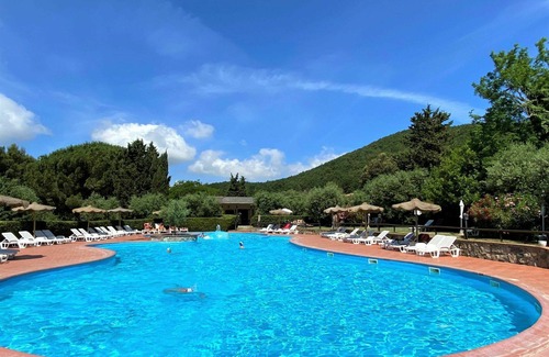 Riparbella Apartment | Beautiful apartment for 3 guests with pool, WIFI, A/C, TV, patio and parking