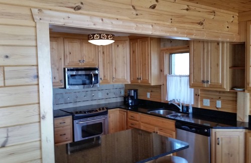 Indian River House | Beautiful Burt Lake sunsets and sandy beach