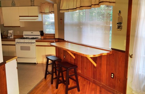 Traverse City Cabin | Beautiful Cabin on the Lake with Hot Tub & Sandy Beach!