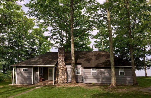 Traverse City Cabin | Beautiful Cabin on the Lake with Hot Tub & Sandy Beach!