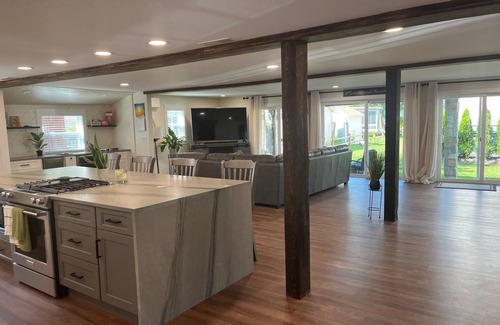 Lochmere House | Beautiful contemporary home with a dock on Lake Winnisquam